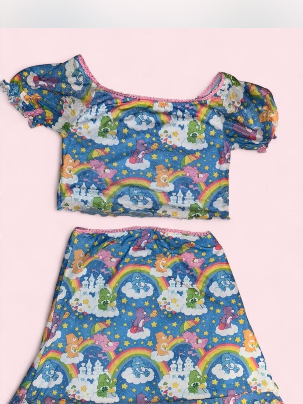 Dolls Kill x Care Bears Blue Rainbow Print Crop Top with Pink Trim - Picture 3 of 7